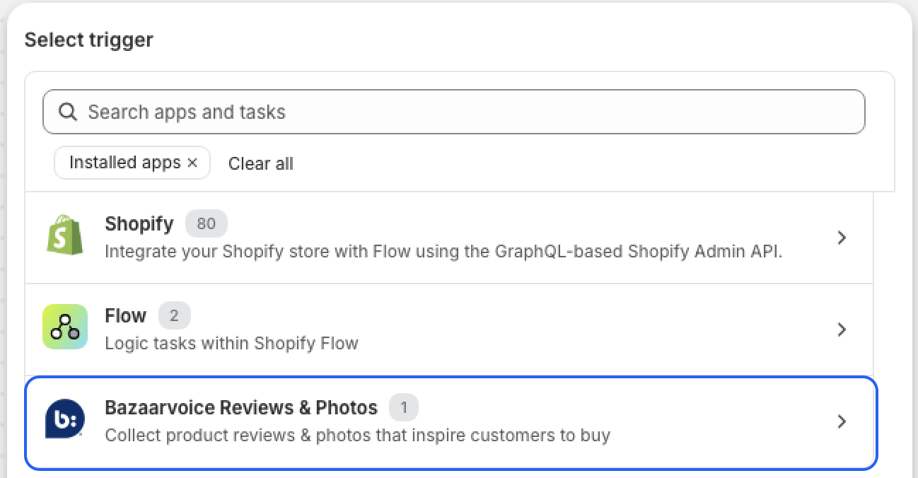 The Select a trigger side panel highlighting the Bazaarvoice Reviews & Photos app category.