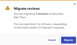 A success message confirmation box stating that the reviews have been successfully migrated.